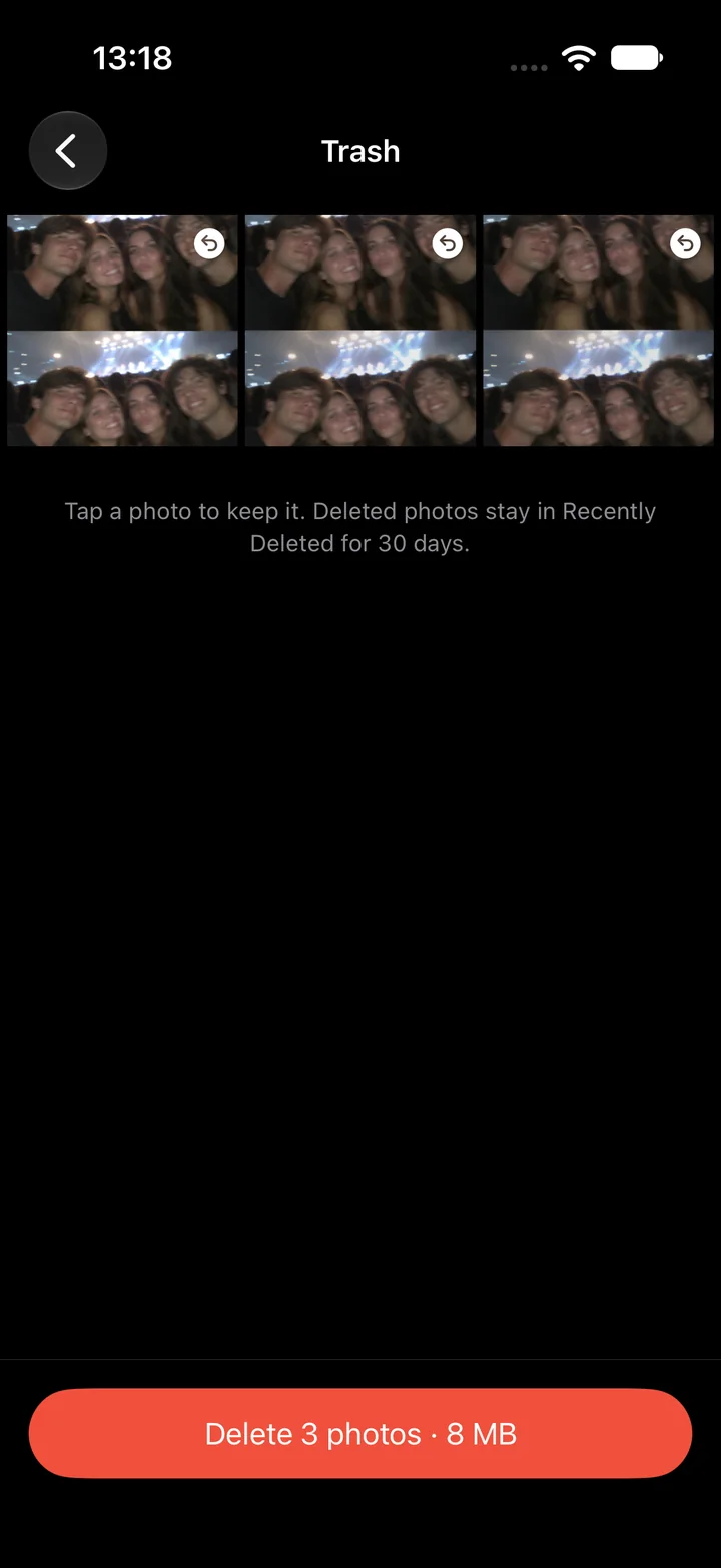 The trash is shown before anything is deleted. Tap a photo to keep it.